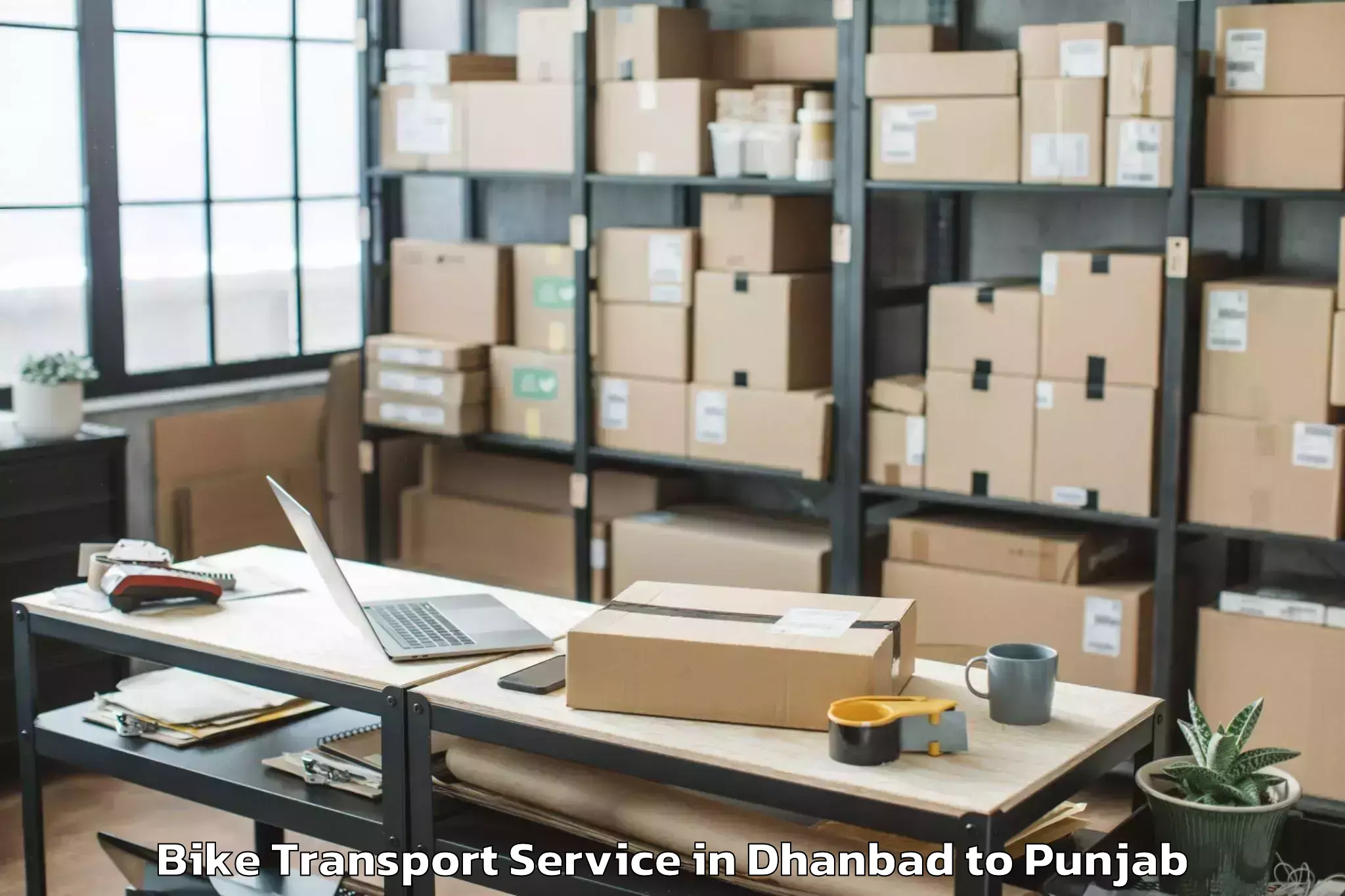 Book Dhanbad to Rahon Bike Transport Online